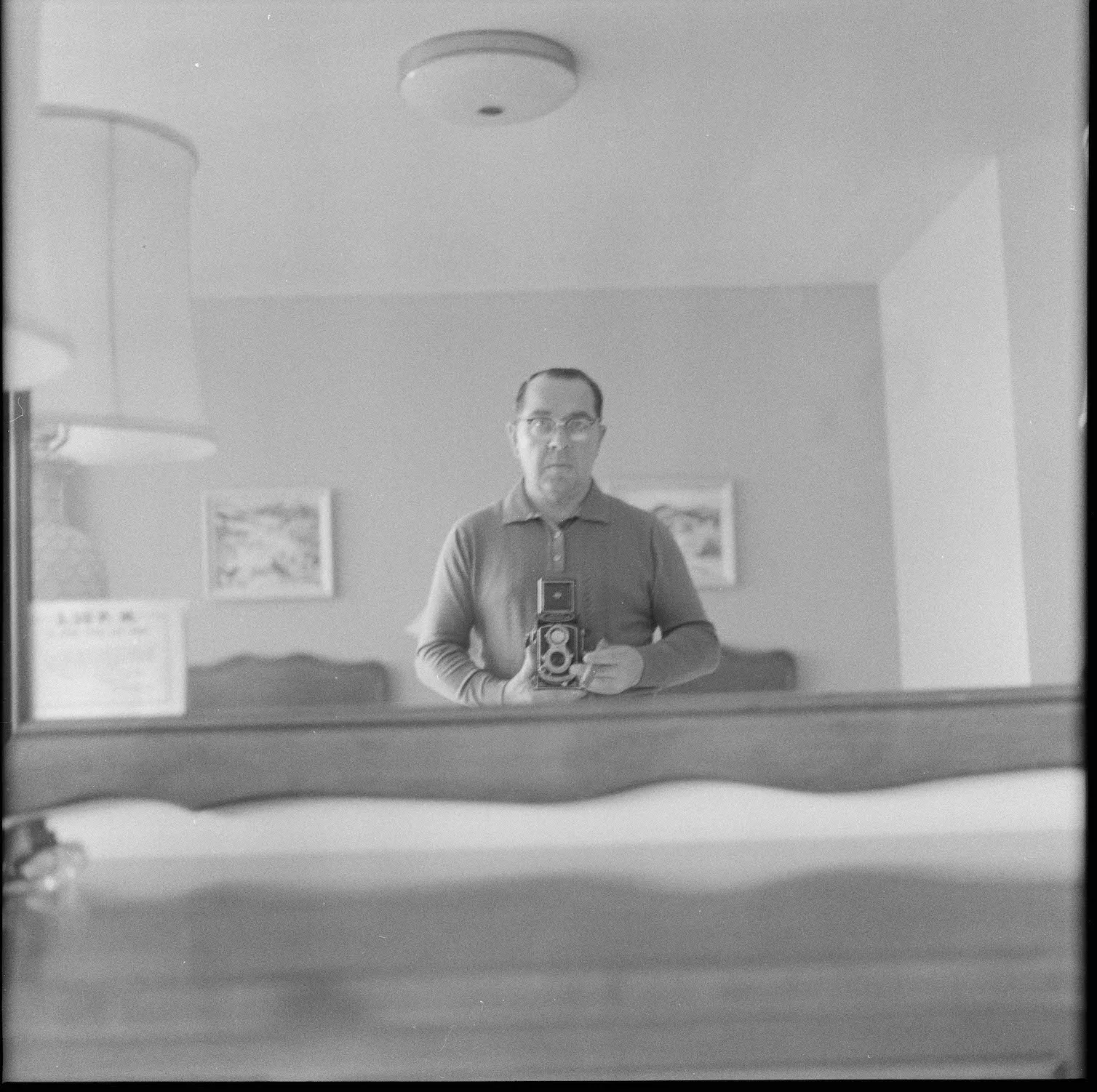 Benjamin Wichansky self-portrait in mirror with camera