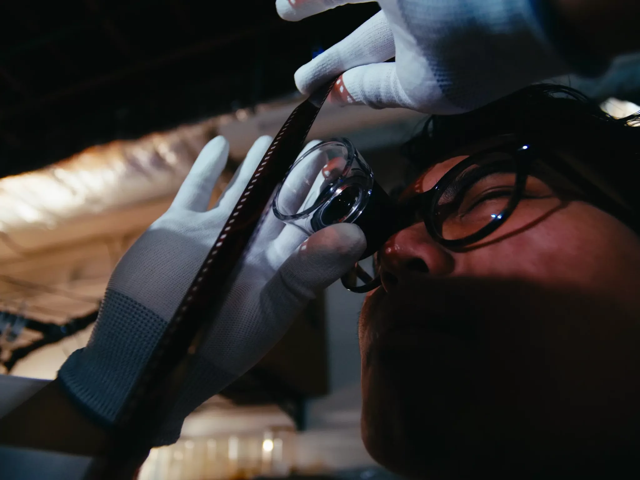 Norm reviewing film negatives